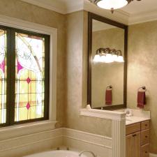 Master Bath Shimmering Lusterstone walls with custom designed mirror frames 1